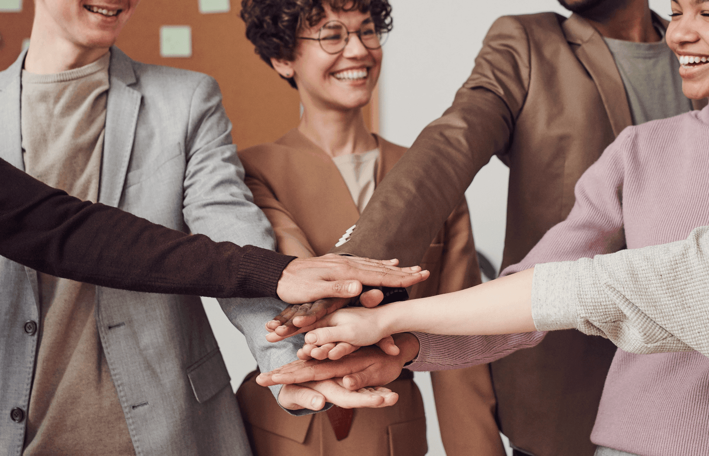 A diverse community celebrating connection, learning, and shared progress