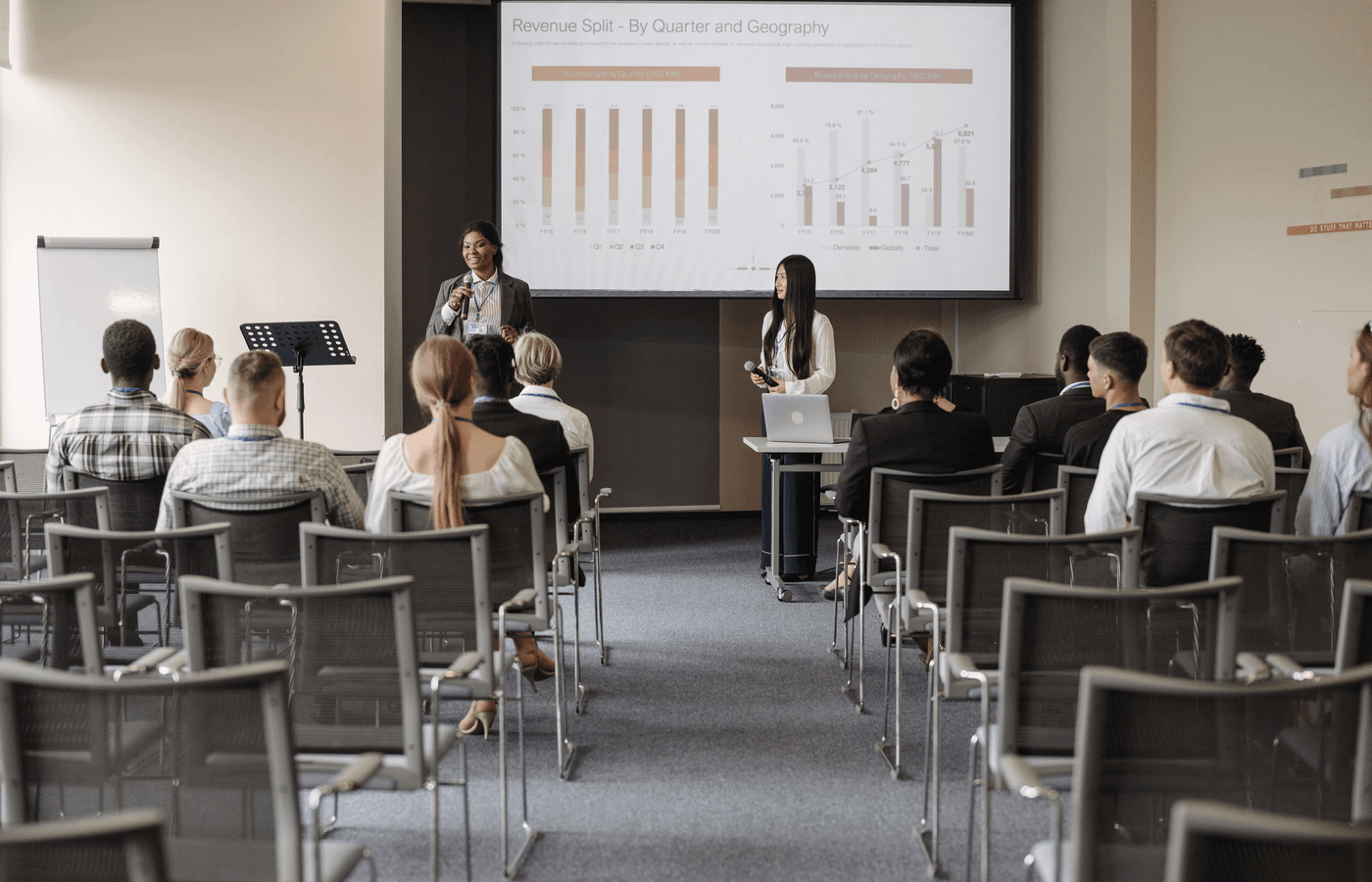 A community workshop with a speaker and diverse audience