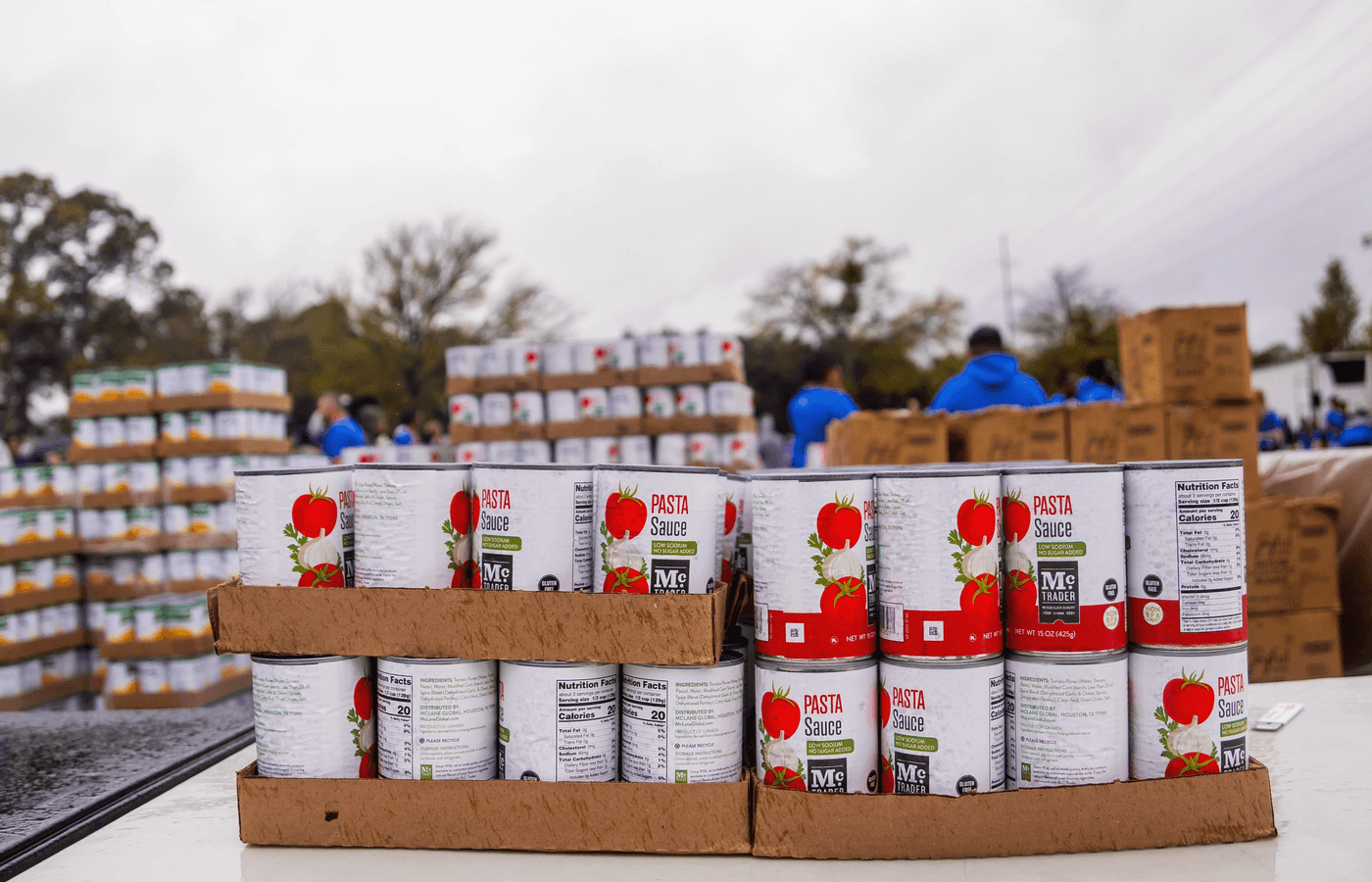 Community volunteers organizing donated food and supplies together